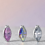 Instinct silver titanium labret top with marquise cut gemstone in blue, green, red, purple, multicolor, or clear.