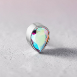 Instinct silver titanium labret piercing with iridescent teardrop gem. Internally threaded.