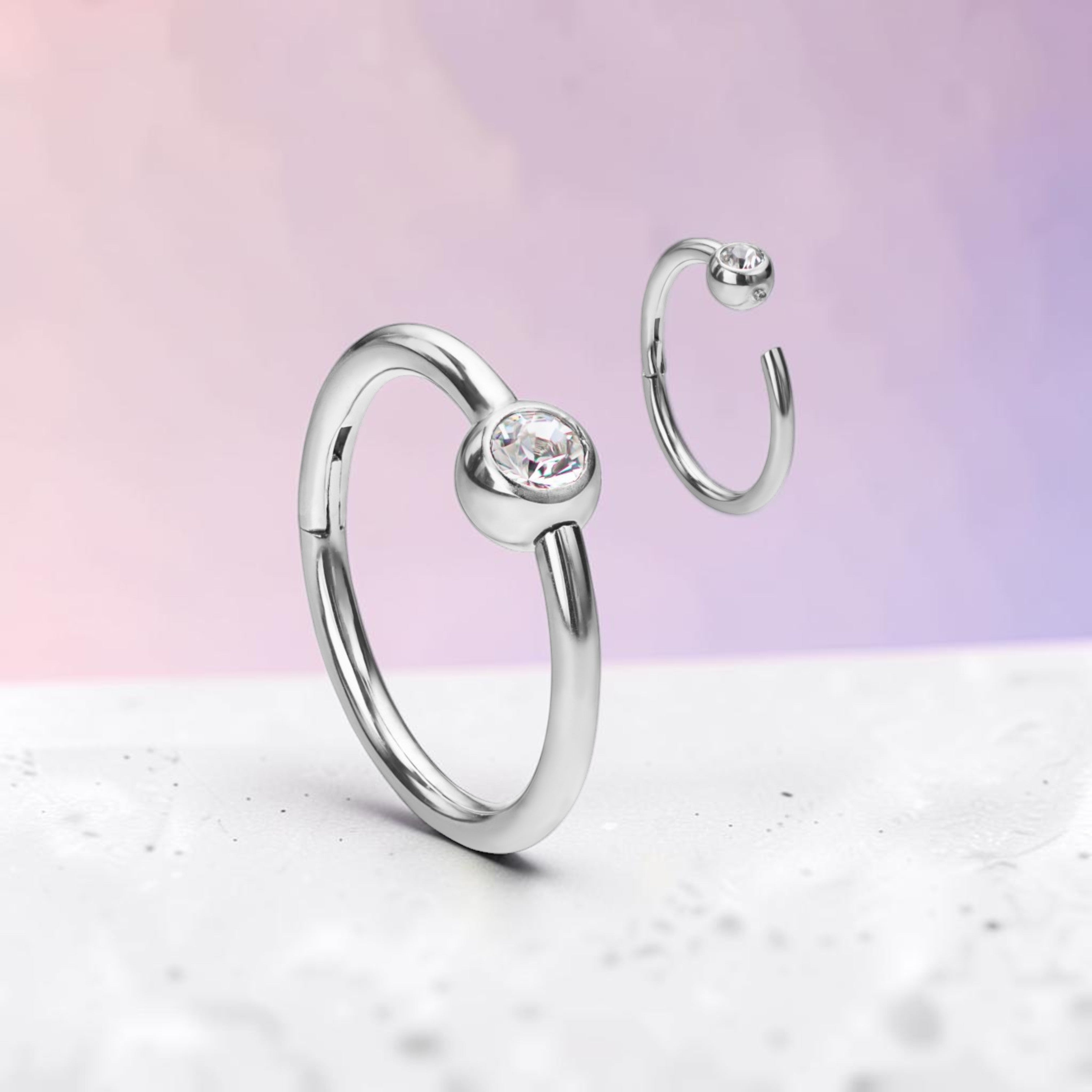 Cerc Titan Argintiu cu Piatră Swarovski Tip Bilă Captivă Clicker – 1.2 mm