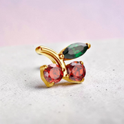 Labret titan auriu filet intern in forma de cirese cu cristale