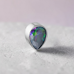 Instinct silver titanium labret with a faceted teardrop-shaped mystic gem. Internally threaded.
